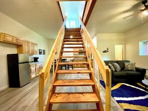 Living area - Cabin with a Treehouse/Hot Tub/Barndominium/Arcade - Sleeps up to 33 (Lakeside)