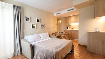 1 dormitorio, tabla de planchar con plancha, wifi gratis y ropa de cama