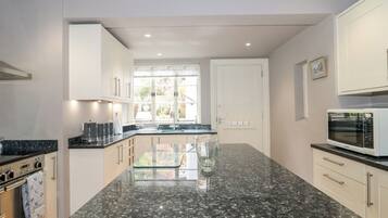 Fridge, electric kettle, toaster, cookware/dishes/utensils