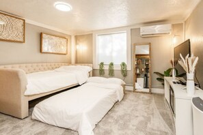 1 bedroom, desk, iron/ironing board, travel cot