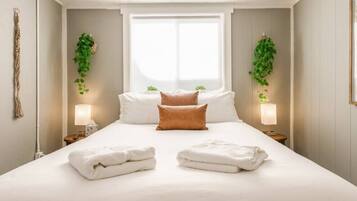 1 bedroom, desk, iron/ironing board, travel cot