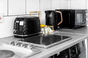 Microwave, oven, toaster, cookware/dishes/utensils