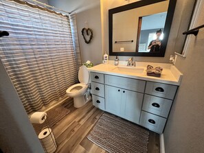Hair dryer, towels, soap, shampoo