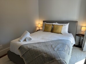 1 bedroom, desk, iron/ironing board, travel crib