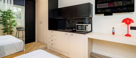 Iron/ironing board, travel crib, WiFi, bed sheets