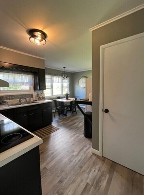 Enjoy casual dining and cooking in this well-equipped kitchen with a central island and ample counter space.