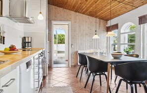 Fridge, stovetop, dishwasher, coffee/tea maker