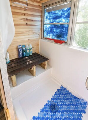 Shower, towels, soap, shampoo