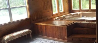 The Getaway Cabin W/ Indoor hot tub and sauna.
