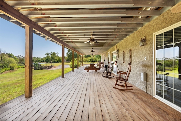 Rocking chairs, picnic table, and games with a view.