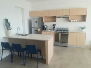 Private kitchen - New apartment with amazing view, front sea with access to the beach. (Tijuana)
