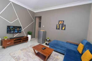 TV, stereo - Highly rated 1-Bed Apartment with in Kampala (Kampala)