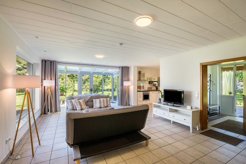 Apartment with Conservatory near Movie Park, Private Terrace, and Wi-Fi
