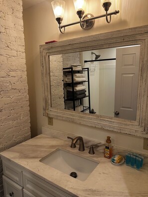 Hair dryer, towels, soap, shampoo