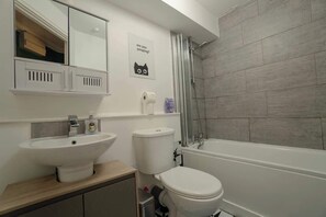 Regadera y secadora de cabello 