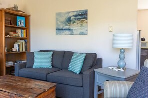 TV, fireplace - Sit Back & Watch Waves at Rathtrevor Cottage (Parksville)
