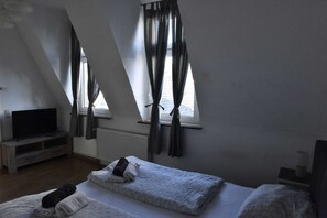 1 chambre, fer et planche Ă repasser, Wi-Fi, draps fournis