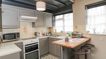 Fridge, electric kettle, toaster, cookware/dishes/utensils