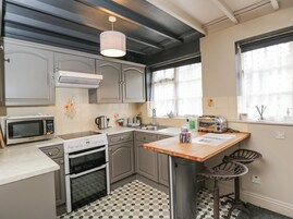 Fridge, electric kettle, toaster, cookware/dishes/utensils
