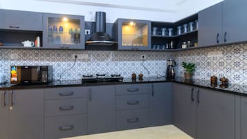 Presidential Villa | Private kitchen | Full-sized fridge, microwave, stovetop, coffee/tea maker