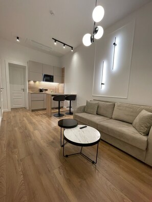 Apartamento Deluxe, 1 habitación | Caja fuerte, decoración individual, mobiliario individual