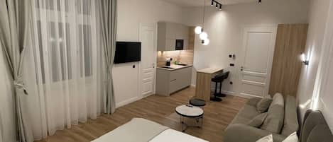 Appartement Confort, 1 grand lit et 1 canapé-lit