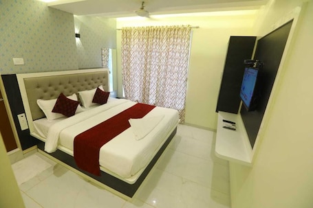 Sistema de insonorización, wifi gratis y ropa de cama . Hotel Sai Siddhi Inn - Navi Mumbai