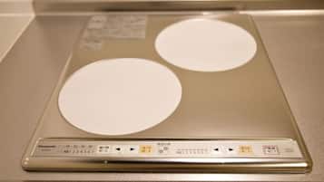 A bathroom scale with Japanese instructions and a digital display.