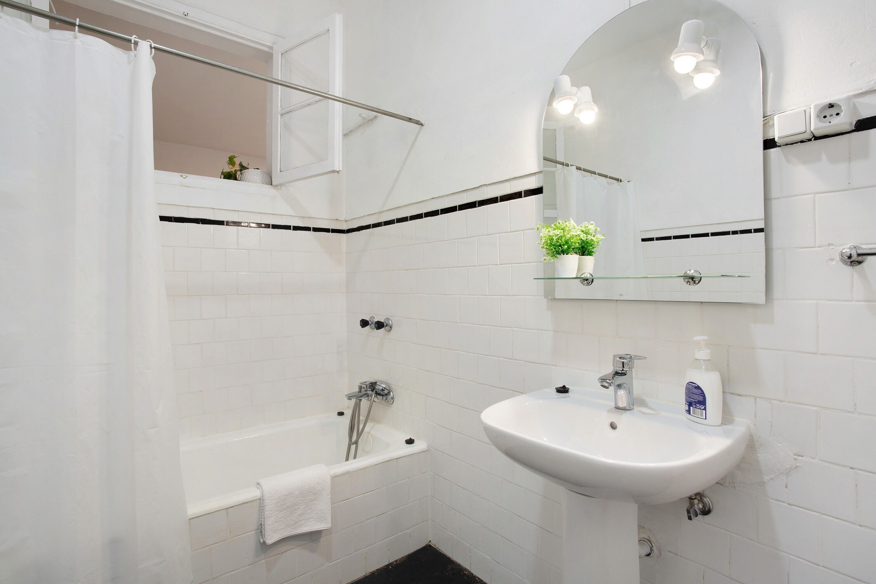 Bathtub, hair dryer, towels