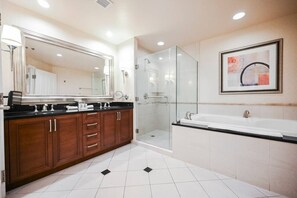 Bathtub, jetted bath, hair dryer, towels