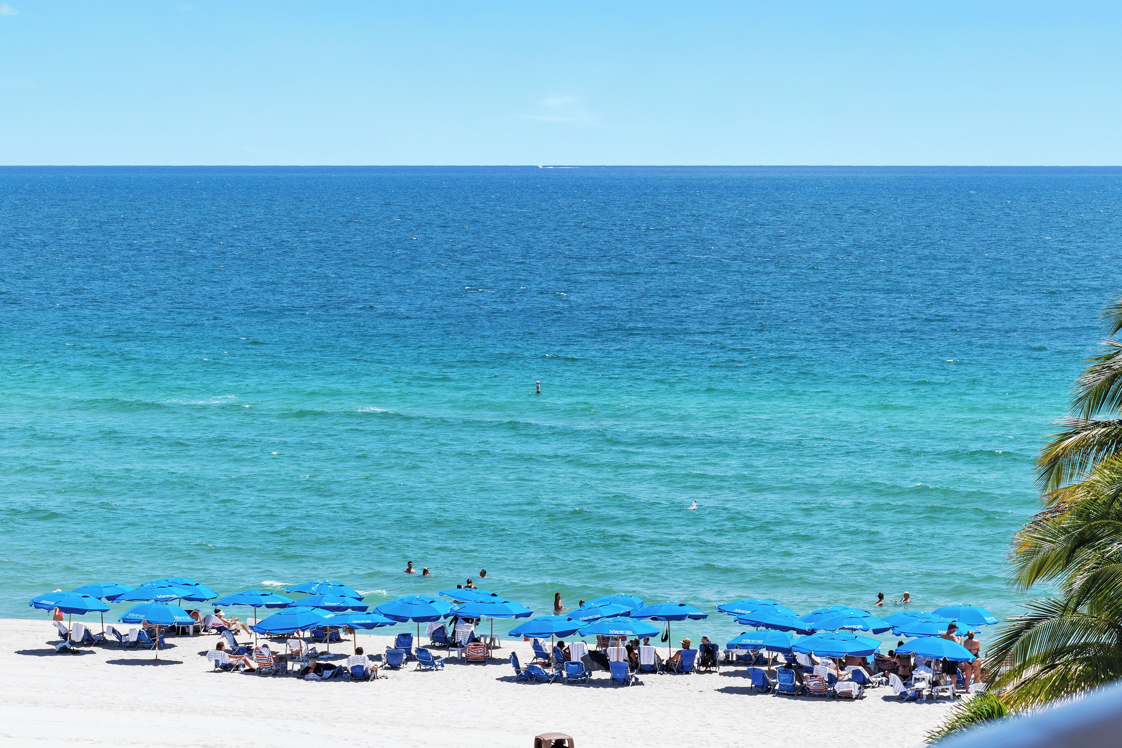 On the beach, sun loungers, beach towels