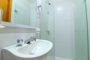 Shower, towels, soap, toilet paper