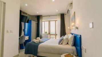 Basic Room, 1 Queen Bed, Balcony, Sea View | 1 bedroom, desk, laptop workspace, free WiFi