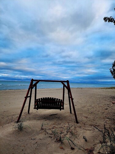 Stunning, fully appointed home on a sugar sand beach of Lake Huron. 