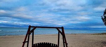 Stunning, fully appointed home on a sugar sand beach of Lake Huron.