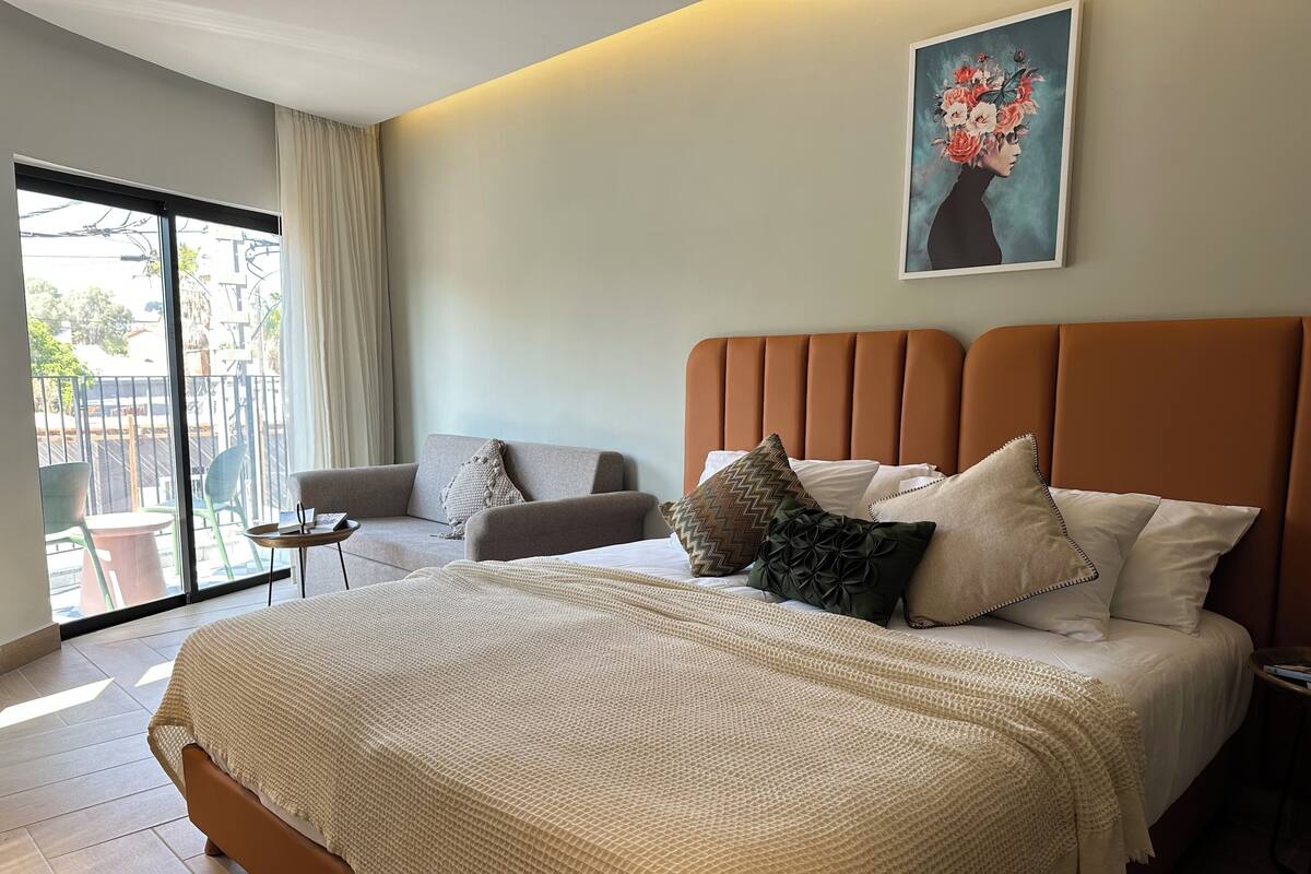 Family Room | Minibar, laptop workspace, blackout drapes, WiFi (free)