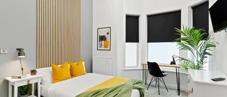 Studio, 1 giường cỡ queen | Truy cập Internet không dây miễn phí, bộ trải giường