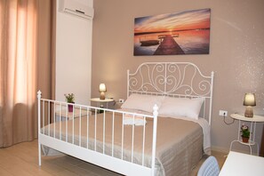 4 slaapkamers, een strijkplank/strijkijzer, gratis wifi, beddengoed