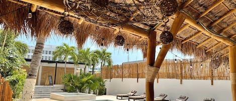 Outdoor pool, open 8:00 AM to 9:00 AM, pool umbrellas, sun loungers