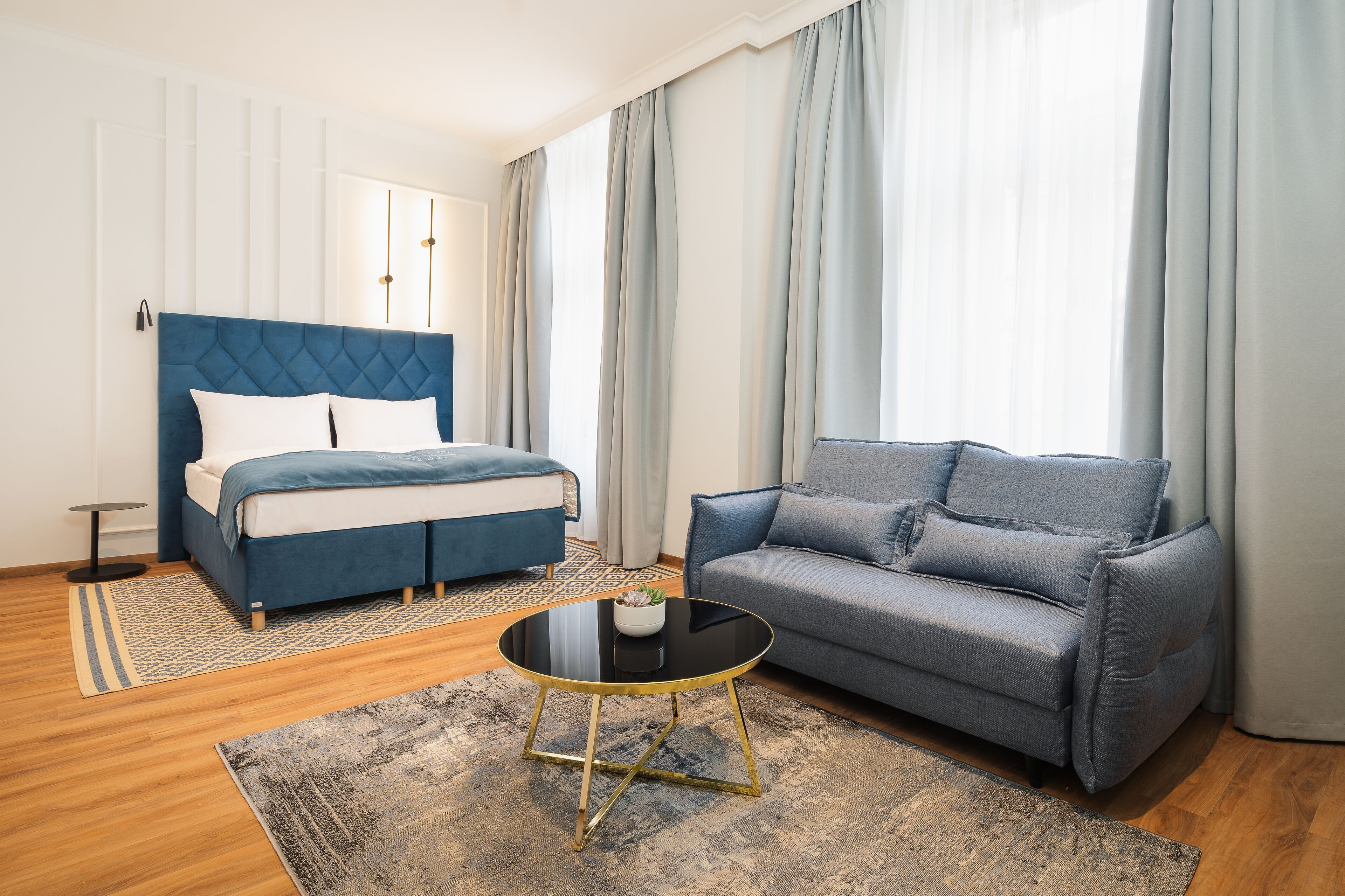 Deluxe Apartment | Living area | 55-inch Smart TV with digital channels