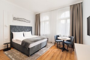 Apartament superior | Roba de llit d'alta qualitat i caixa forta a l'habitació 