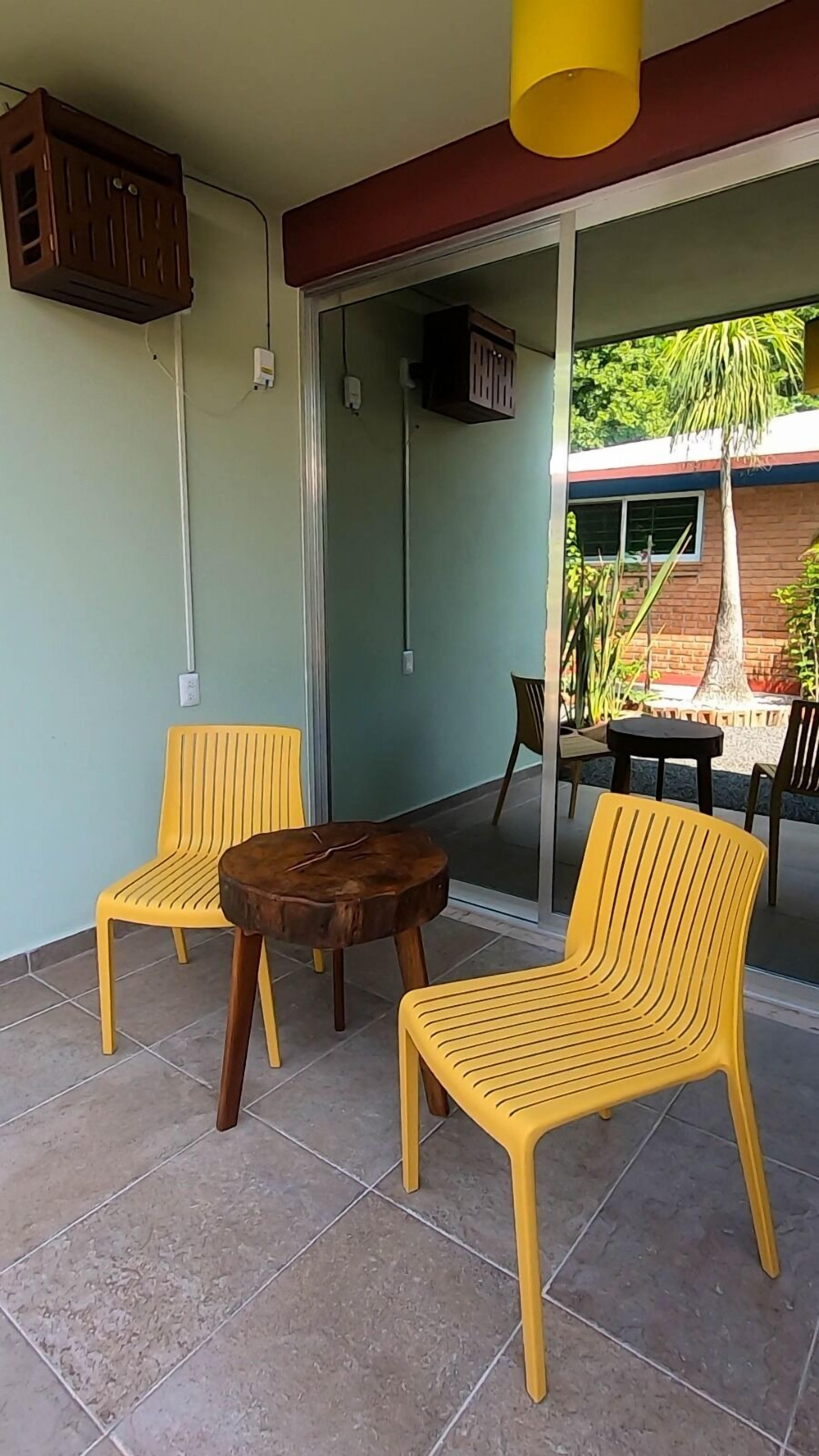 Habitación doble Deluxe, Terraza, vista al patio | Terraza o patio