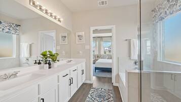 Shower, hair dryer, towels, toilet paper