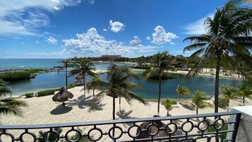 On the beach, sun loungers, beach towels