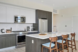 Fridge, microwave, oven, stovetop - Lofted Living w/ Garage Spot (Denver)