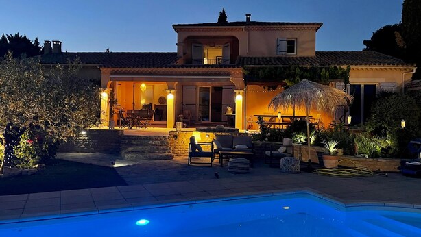 A two-story house with a swimming pool, outdoor seating, and a well-lit patio area. - Beautiful villa with pool close to Mont-Ventoux (La Roque-sur-Pernes)