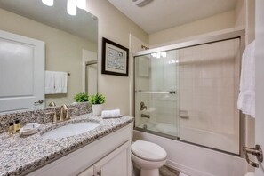 Bathtub, hair dryer, towels