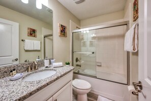 Bathtub, hair dryer, towels