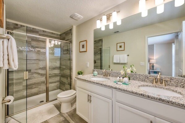 Bathtub, hair dryer, towels
