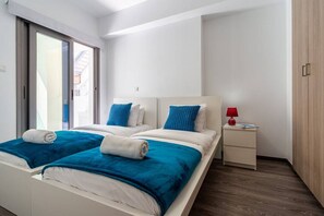 2 bedrooms, iron/ironing board, WiFi, bed sheets